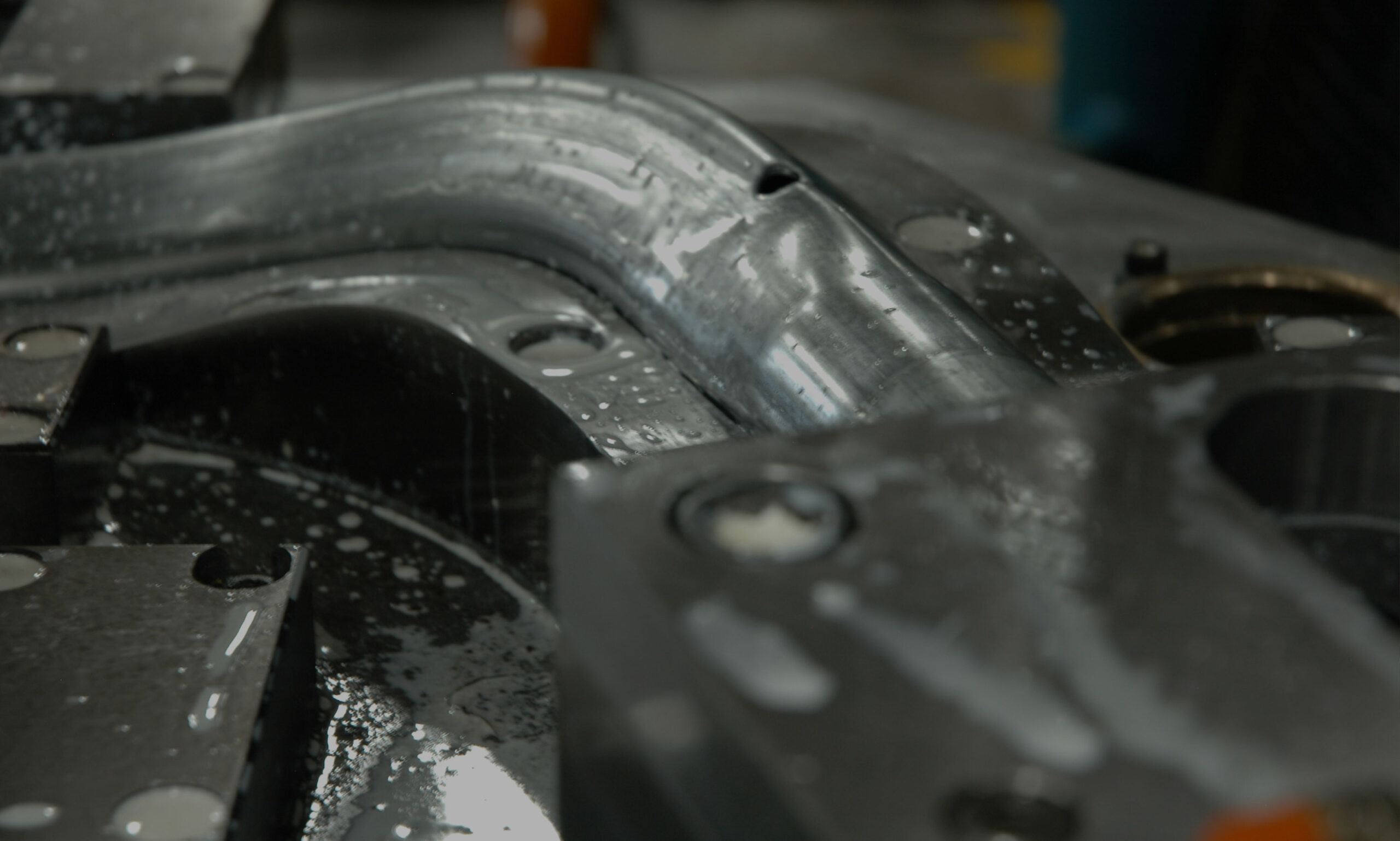 a photo of hydro forming a tube